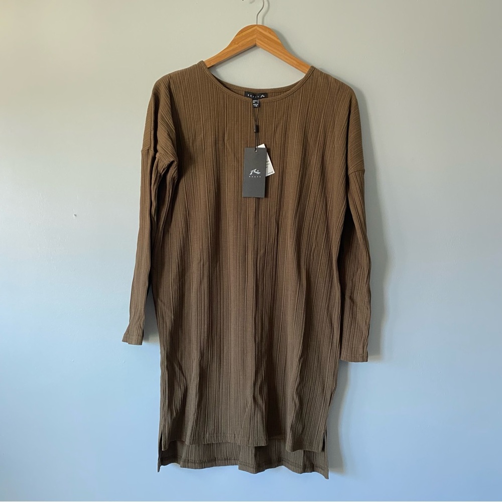Long sleeved, form-fitting, stretchy dress.